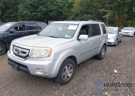 2009 Honda Pilot Touring z USA, uszkodzony, nr VIN 5FNYF48959B020092